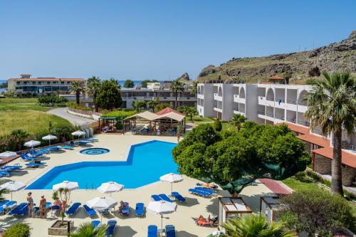 an overhead view of the pool at a resort at Lardos Bay Hotel in Lardos