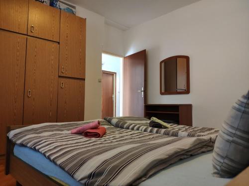 Posteľ alebo postele v izbe v ubytovaní Apartment Onix