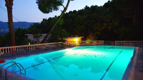 Bazén v ubytování Lions 2 Studios & Apartments, Poros Island. nebo v jeho okolí