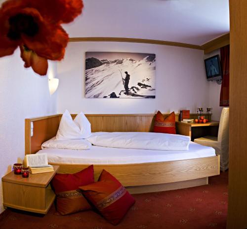 Postel nebo postele na pokoji v ubytování Hotel Alpenfriede
