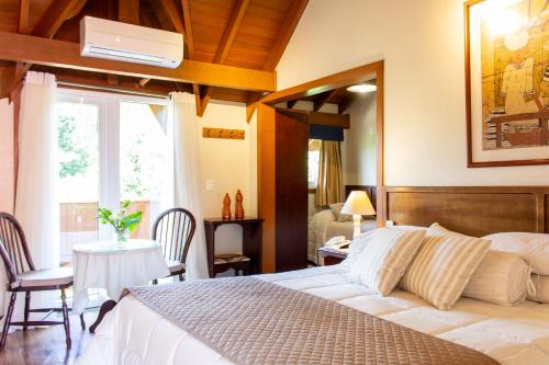 Katil atau katil-katil dalam bilik di Hotel Canto Verde