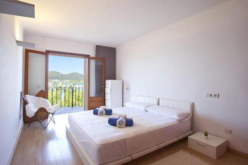 Postel nebo postele na pokoji v ubytování Apartamento Ciutadella 1