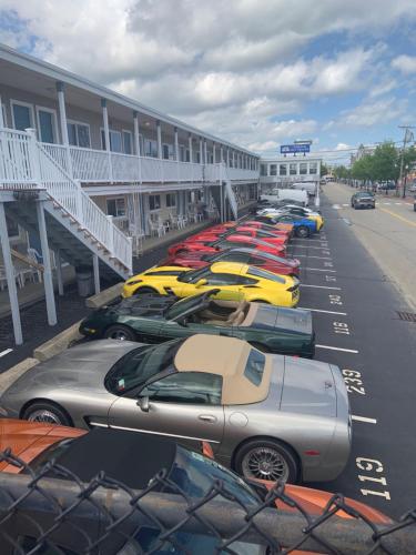 a row of cars parked in front of a building at Mt Royal Motel in Old Orchard Beach