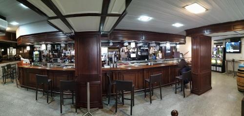 Ο χώρος του lounge ή του μπαρ στο Hostal El Arco