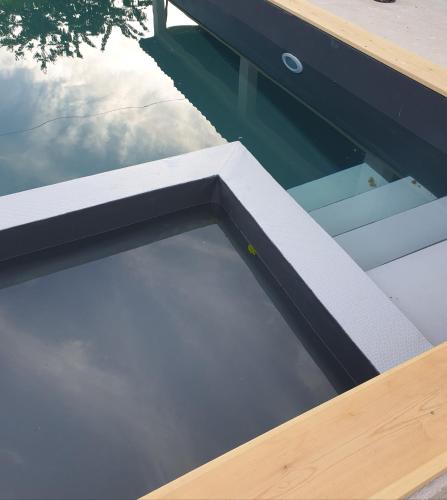a swimming pool in the floor of a house at La Martinelle in Maurs