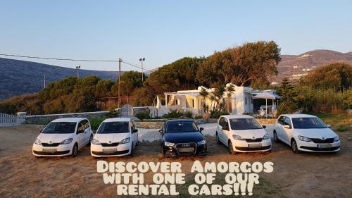 a group of cars parked in a parking lot at Amorgos Pearls in Katapola
