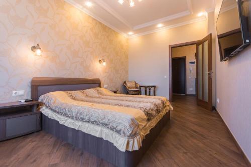 Cama o camas de una habitación en Ideal House
