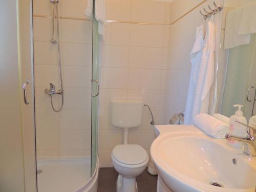 Ένα μπάνιο στο Apartments Ivan D