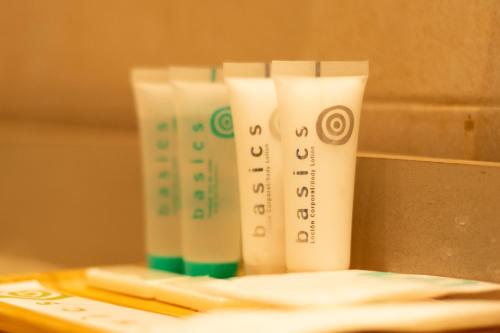 a group of tubes of toothpaste sitting on a counter at Hotel VillaMarcilla in Marcilla