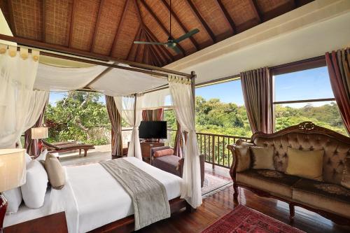 A bed or beds in a room at Gending Kedis Luxury Villas & Spa Estate