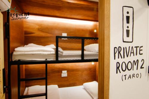 Postel nebo postele na pokoji v ubytování Tropical Summer Hostel