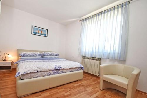 Cama o camas de una habitación en Apartments and Rooms Branka