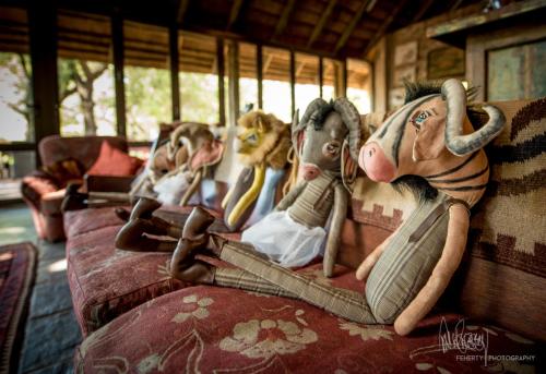 a group of stuffed animals sitting on a trolley at Rio Dos Elefantes River Camp in Hoedspruit