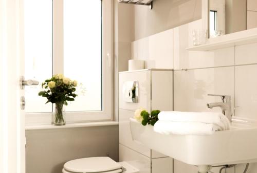 Ένα μπάνιο στο Stadt Apartments Burg Fehmarn