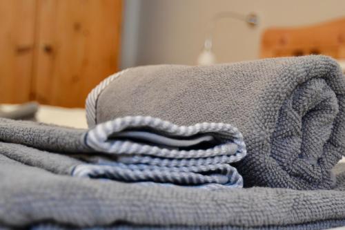 a blanket laying on top of a bed at Berghof Niederthai in Niederthai