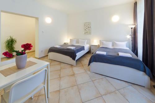 Cama o camas de una habitación en Charles Bridge Apartments