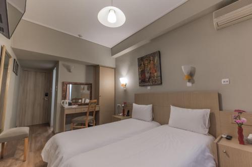 Cama o camas de una habitación en My Athens Hotel