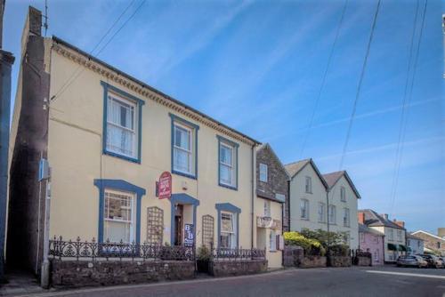 a building on the side of a street at Glendower in St. Davids
