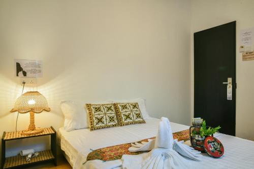 Letto o letti in una camera di Ohana House HQ