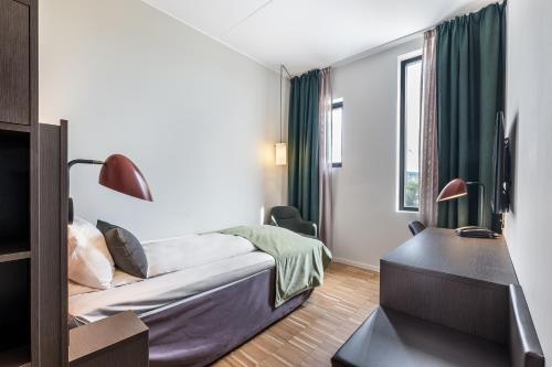 Quality Hotel Pondにあるベッド