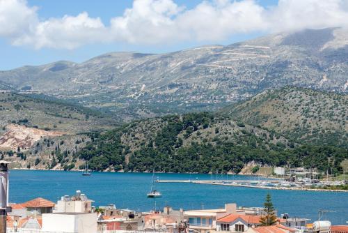 a view of a large body of water with mountains at Elegant Living in Argostoli