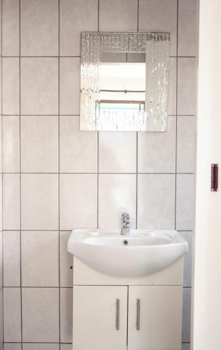 Ένα μπάνιο στο Kelzane Self-Catering