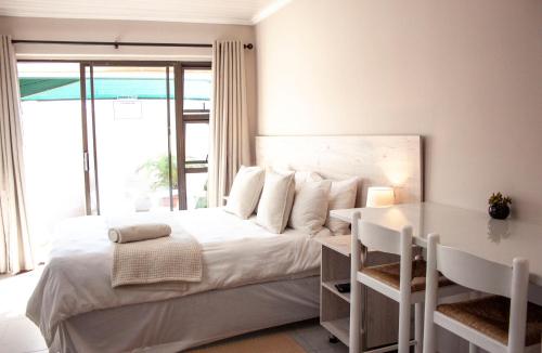 Ένα ή περισσότερα κρεβάτια σε δωμάτιο στο Kelzane Self-Catering