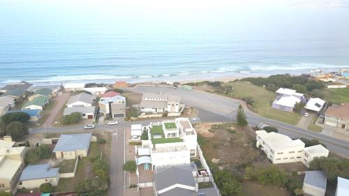 an aerial view of a town next to the ocean at Withuis Hartenbos - No Load Shedding in Hartenbos
