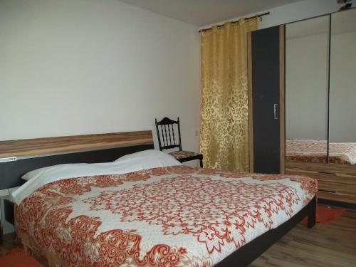 Ένα ή περισσότερα κρεβάτια σε δωμάτιο στο Hodak Apartment