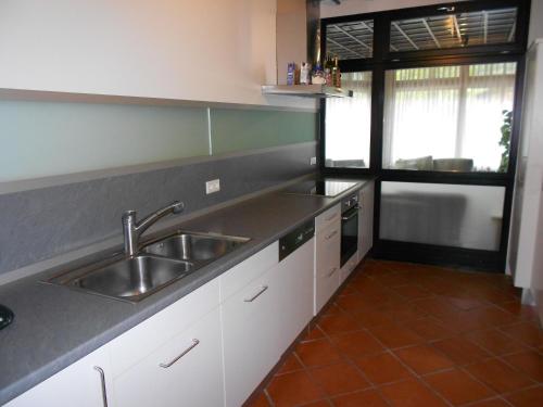 a kitchen with a sink and a counter top at Residence Silvester in Racines