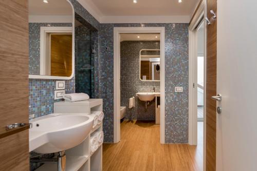 Koupelna v ubytování T-Suite Hotel