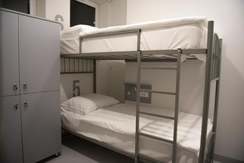 Llit o llits en una habitació de Hostel Boje