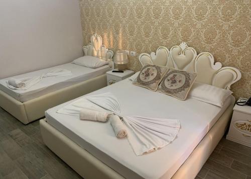 Ένα ή περισσότερα κρεβάτια σε δωμάτιο στο Hotel Antalya - Beach Durres