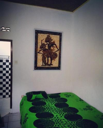 Кровать или кровати в номере Lia Homestay