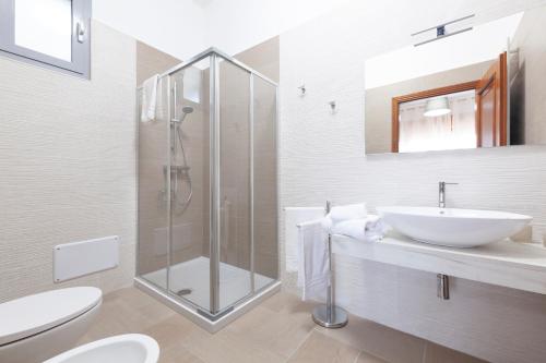Koupelna v ubytování Lupomonaco Rooms