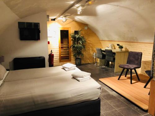 Postel nebo postele na pokoji v ubytování Hotel de Prince