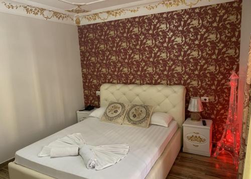 Ένα ή περισσότερα κρεβάτια σε δωμάτιο στο Hotel Antalya - Beach Durres