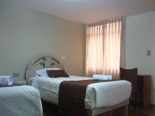 Postel nebo postele na pokoji v ubytování Mística Boutique Hotel