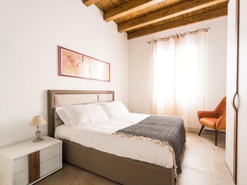 Lova arba lovos apgyvendinimo įstaigoje Santa Cecilia Apartments by Wonderful Italy