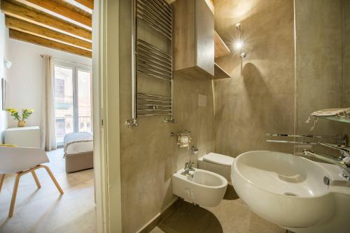 Vonios kambarys apgyvendinimo įstaigoje Santa Cecilia Apartments by Wonderful Italy
