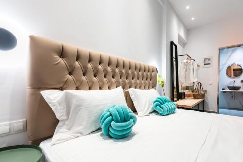 Postel nebo postele na pokoji v ubytování Delight Suites