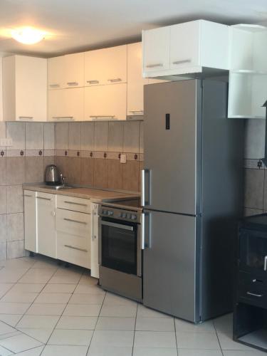 Kuchyň nebo kuchyňský kout v ubytování Veselinka Apartments & Rooms