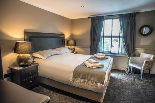 Кровать или кровати в номере N'ista Boutique Rooms Birkdale, Southport