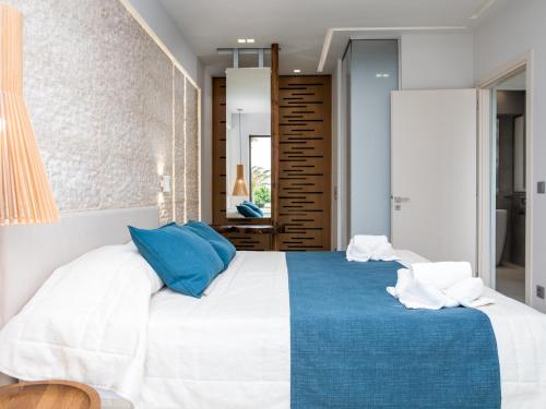 Ένα ή περισσότερα κρεβάτια σε δωμάτιο στο Marinos Beach Hotel