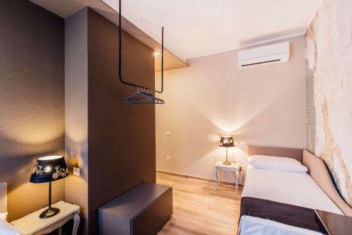 Postel nebo postele na pokoji v ubytování Suite 106
