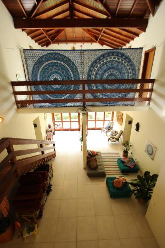 an overhead view of a living room with a ceiling at Casa Viva Itamambuca in Ubatuba
