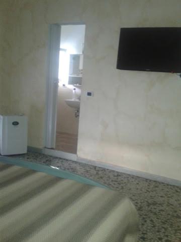 Μια τηλεόραση ή/και κέντρο ψυχαγωγίας στο Bed And Breakfast Il Subacqueo