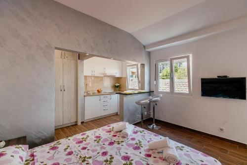Η κουζίνα ή μικρή κουζίνα στο Apartman Mia