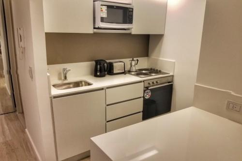 Η κουζίνα ή μικρή κουζίνα στο Fabuloso departamento con todo y cerca de todo