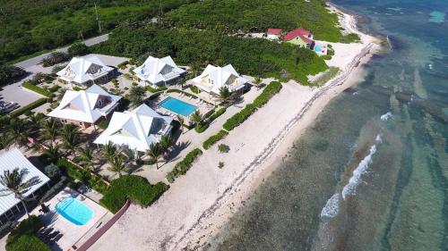an aerial view of a resort on a beach at Ocean Paradise in Brinkleys